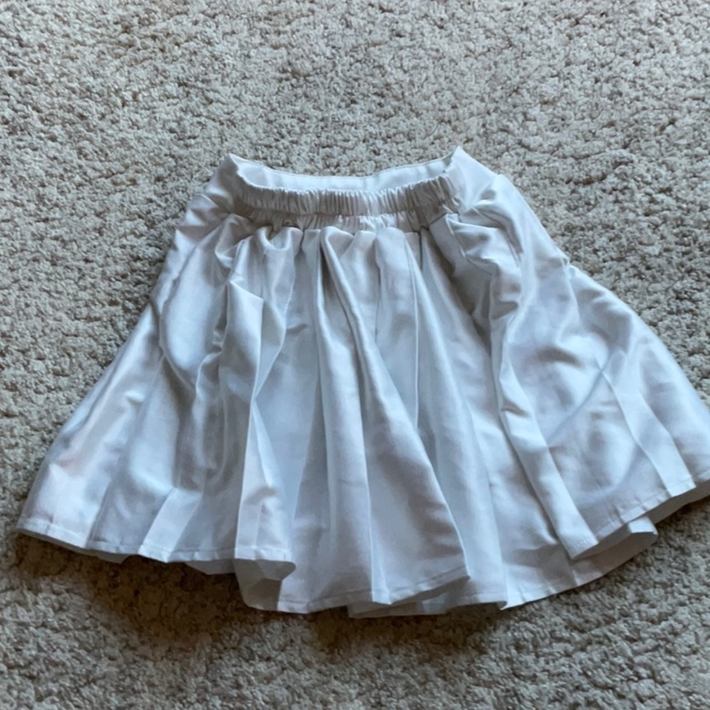 White womans tennis skirt!